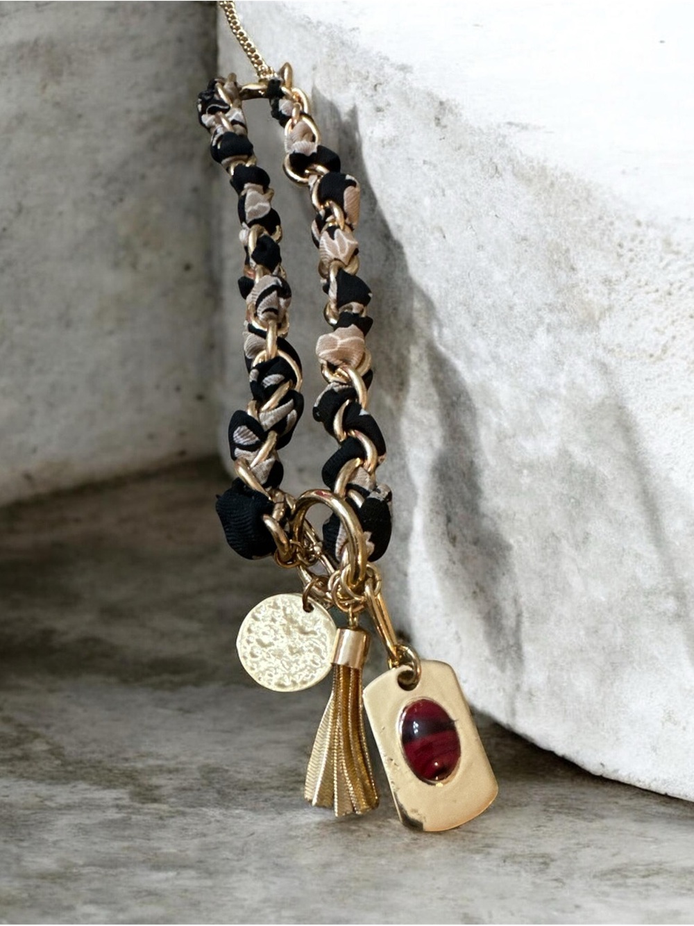 Gold-Plated Necklace with Black & Beige Woven Chain and Red Stone Charm
